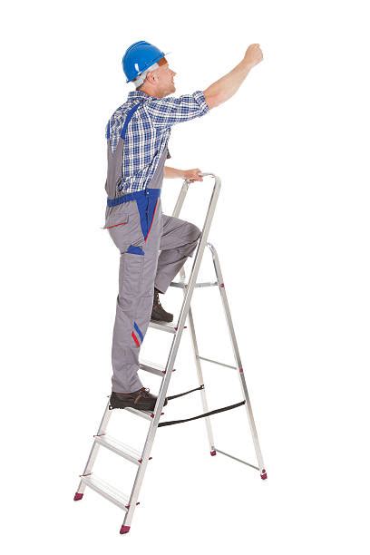 Royalty Free Man On Ladder Pictures, Images and Stock Photos - iStock