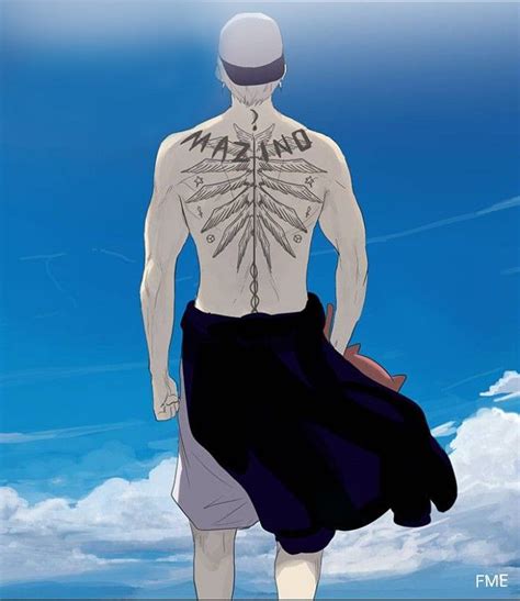 a man with tattoos on his back walking in the sky