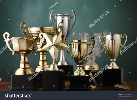 PowerPoint Template: award - group of the trophies (jlpijluko)