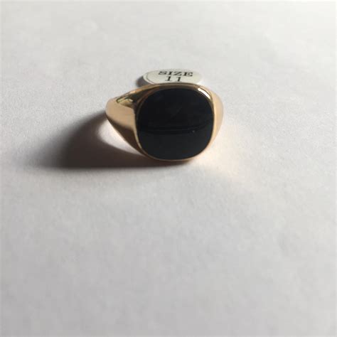 GOLD & BLACK RING Gold plated alloy size 6 7 8 10... - Depop