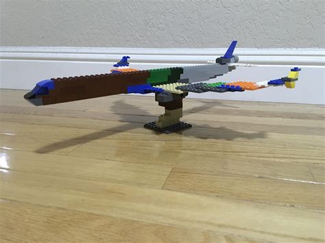 My best attempt of a DC-10 Made entirely out of scrap parts from my LEGO bin. : r/lego