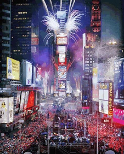 fireworks are lit up in the middle of times square as people walk down ...