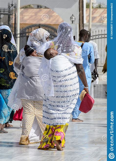 Unidentified Senegalese People in Long Traditional Clothes Walk ...