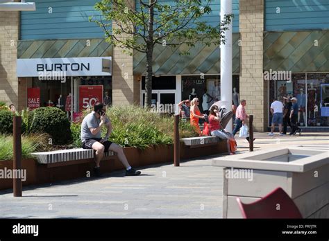 Retail shop signs at Glasgow Fort shopping centre Stock Photo - Alamy