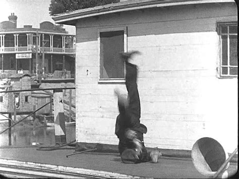 Buster Keaton stunts: Amazing cat-like fall! (Steamboat Bill, Jr) | Busters, Stunts, Steamboats