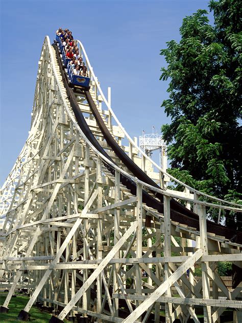 a roller coaster with people riding on it