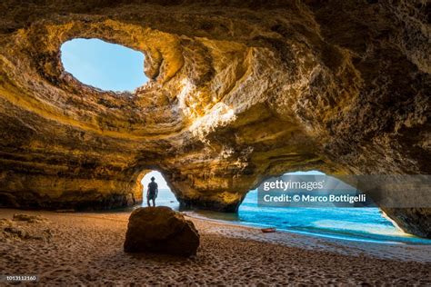 Solitary Man Inside The Benagil Caves Portugal High-Res Stock Photo - Getty Images