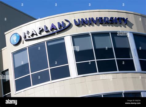 A logo sign on a building occupied by Kaplan University Stock Photo - Alamy