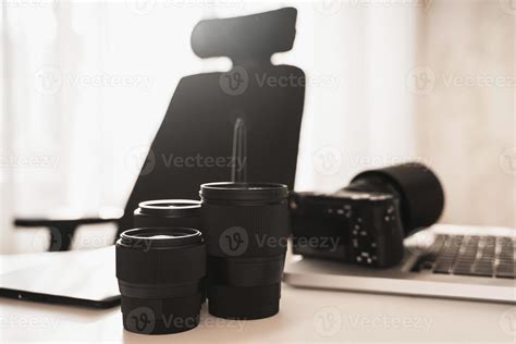 Workplace with a modern equipment for photography. Mirrorless camera ...