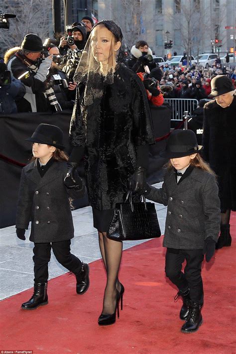 Family support: Celine DIon arrived at her husband's funeral surrounded by her children and ...