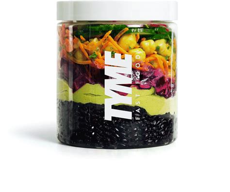 a jar filled with lots of different types of fruit and veggies in it