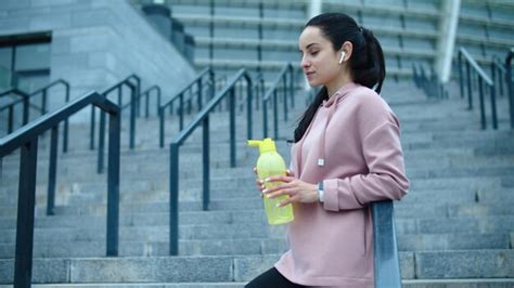 Premium Photo | Athlete woman drinking water in slow motion Thirsty ...