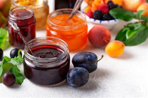 Premium Photo | Assortment of different jams in jars