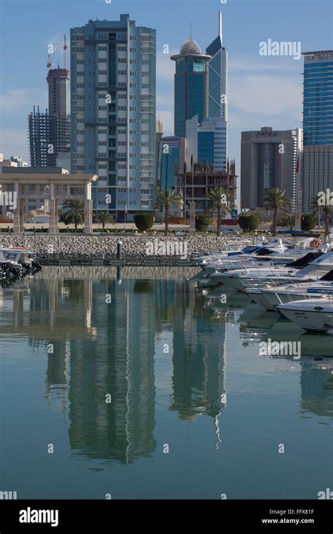 Kuwait City marina in Salmiya with cityscape behind Stock Photo - Alamy