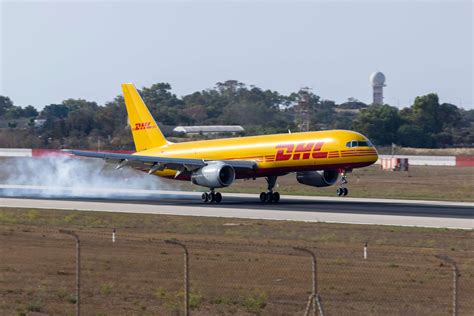 DHL Boeing 757 freighter tail breaks off after skidding off runway - AeroTime