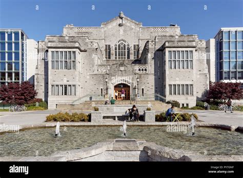 Students in front of the 1925 UBC Main Library and the Irving K. Barber ...