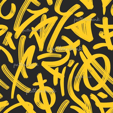 yellow and black graffiti alphabets on a black background