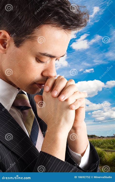 Young man praying stock photo. Image of faith, light - 18692752