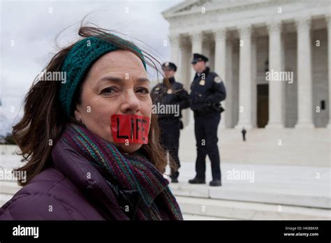 Taped mouth protest usa hi-res stock photography and images - Alamy