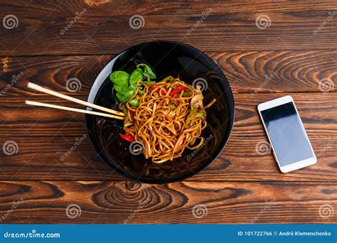 Chinese Food in a Plate on a Brown Wooden Table. Stock Photo - Image of ...