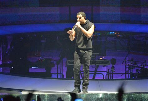 Drake on stage at Phones 4U Arena - Manchester Evening News