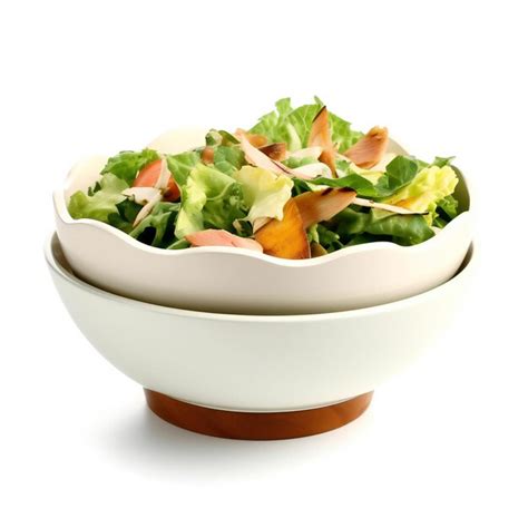 Premium AI Image | Salad in a bowl isolated on white background