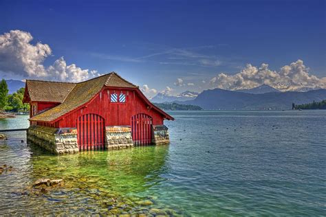 Red boat wooden house on Lake Lucerne, Switzerland ωнιмѕу ѕαη∂у | Red ...