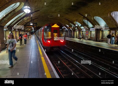 A train leaving Baker Street underground station, one of the oldest ...