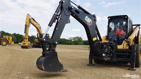 Caterpillar's Smart Backhoe Attachment Gives Skid Steers a Full-Featured 8-ft Dig Depth. - YouTube