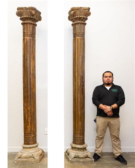 Sold at Auction: PAIR, 20TH C. CLASSICAL CARVED WOOD COLUMNS