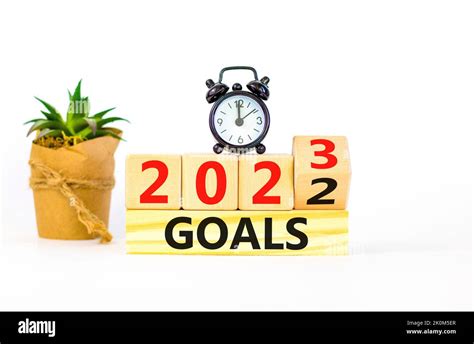 Planning 2023 goals new year symbol. Turned a wooden cube and changes ...