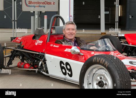 Racing driver and TV presenter, Tiff Needell, sitting in the cockpit of ...