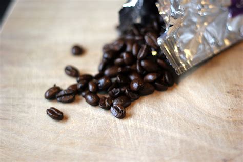 brown coffee beans on beige board free image | Peakpx
