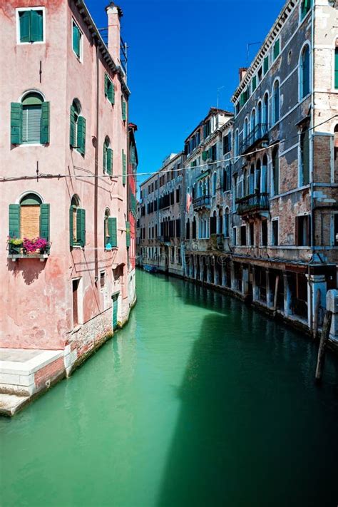 Venice Canal With Houses Standing In Water Stock Photo - Image of italian, city: 15556174