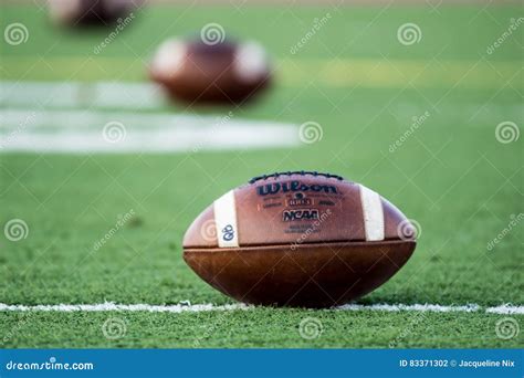 Wilson Footballs editorial photography. Image of coach - 83371302