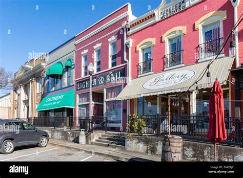 Opelika, Alabama, USA-March 3, 2021: Historic buildings along Railroad Avenue in Opelika's ...