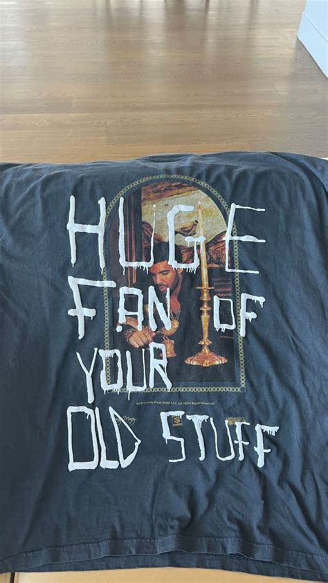 a black t - shirt with white writing on it that says hope for your old stuff