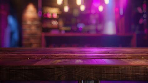 Premium Photo | Wood table top counter with night cafe club background ...