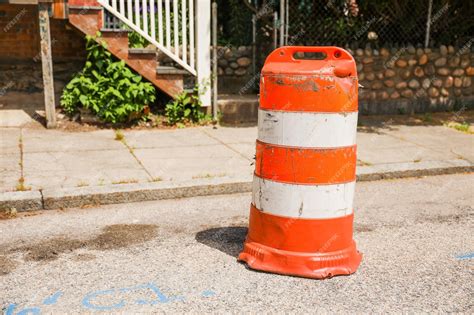 Premium Photo | Orange construction cones represent construction zones roadwork caution and ...