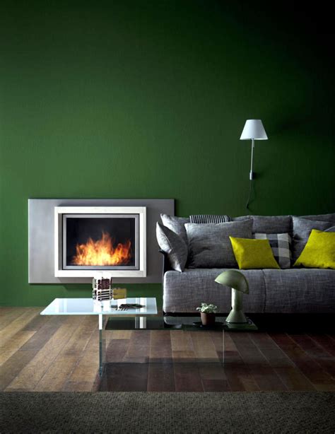 Fireplace in front of a green wall | Interior Design Ideas - Ofdesign