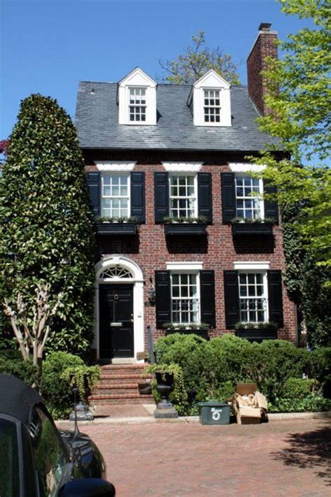 brick house with black shutters - Wordly Account Gallery Of Photos