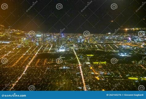 Night Aerial View of Melbourne Skyline from a Landing Airplane ...