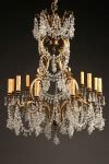Late 19th century antique French 12 arm bronze and crystal chandelier.