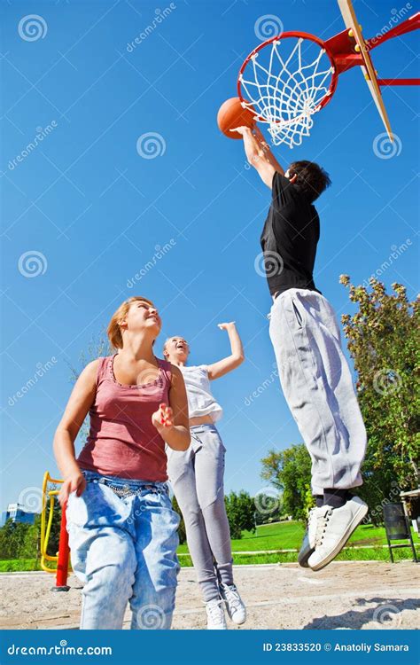 Teenagers Playing Basketball Stock Photo - Image: 23833520