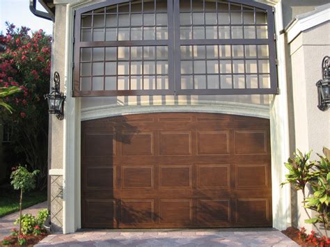 Faux painted garage door. Even fake molding! | Garage makeover, Garage door paint, Garage doors