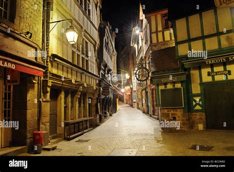 The streets of Mont St Michel at night Stock Photo - Alamy