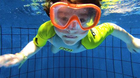 Child Swimming Underwater