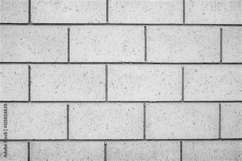 White concrete brick wall texture and background closeup view. Stock Photo | Adobe Stock