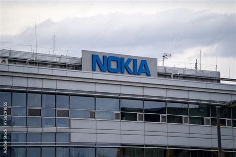 Nokia building with logo sign in Kraków. Telecommunications company office signage with brand ...