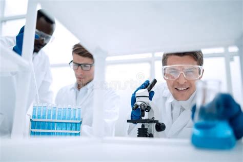 Group of Microbiologists in the Workplace in the Laboratory Stock Photo - Image of indoors ...